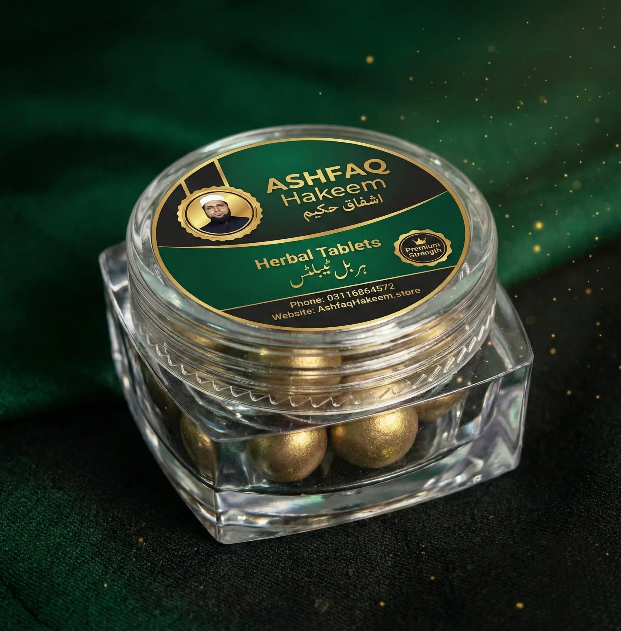 ASHFAQ Hakeem Herbal Tablets in clear jar with gold label on green fabric