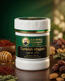 ASHFAQ Hakeem Turkish Majun herbal supplement jar on wooden table with dates and nuts